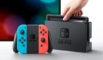 Consola Nintendo Switch negra con mandos Joy-Con derecho de color rojo neón - Imagen 3