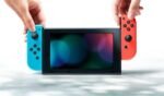 Consola Nintendo Switch con un par de mandos inalámbricos Joy-Con en rojo y azul - Imagen 5